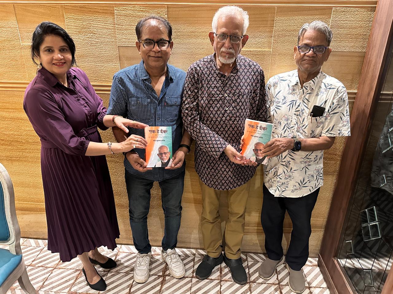 Pandit Mustafa Arif presented his book to the experts present.